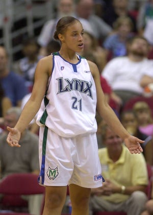 Tamara Moore, while playing for the Minnesota Lynx in 2002. Photo credit: Ann Heisenfelt, AP.